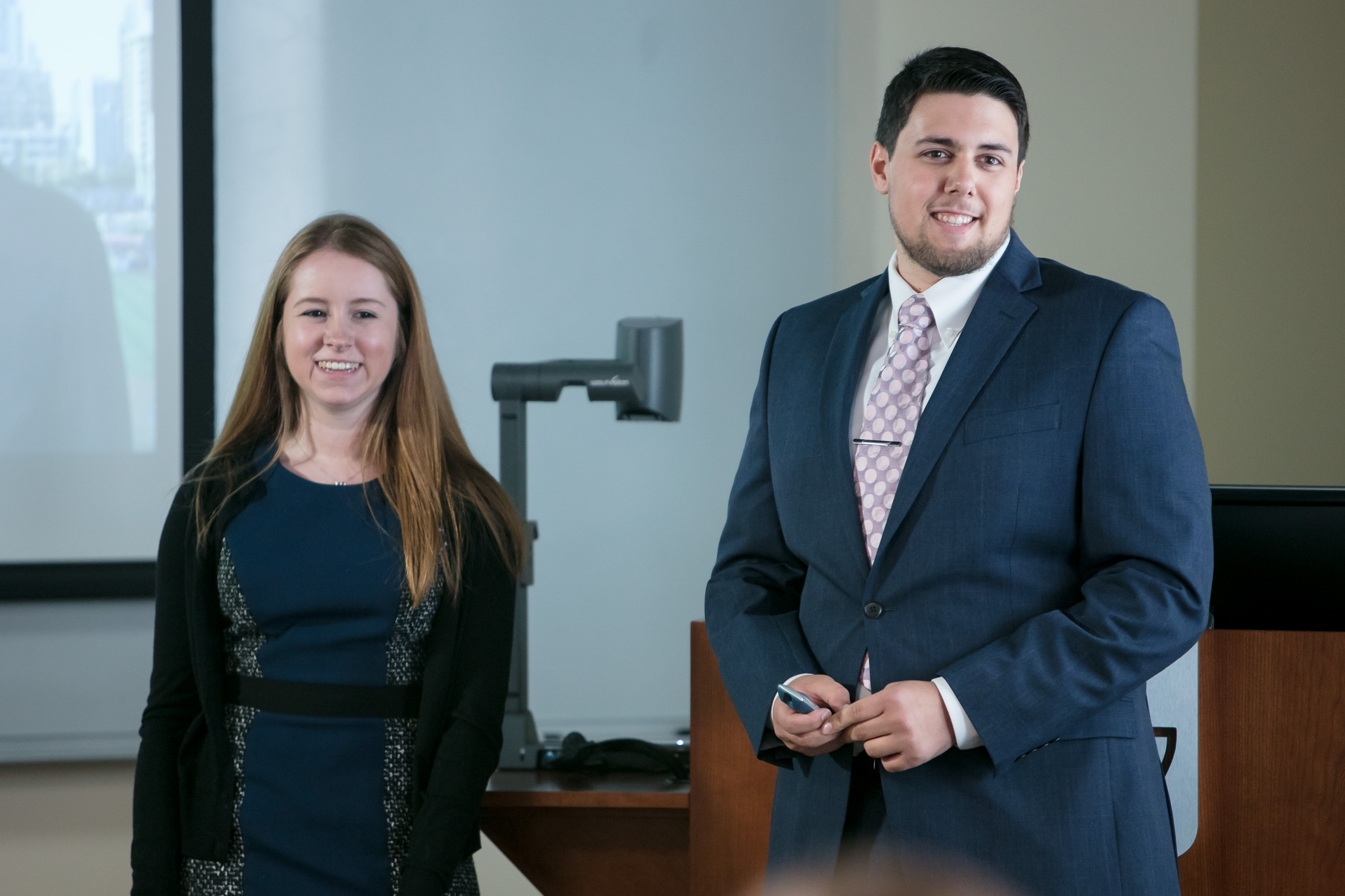 PRAD students Melissa Bellew, left, and Ben Gartland present campaign plan ideas about sustainability to FOX Sports, 21st Century Fox and Major League Baseball executives. (DePaul University/Jeff Carrion)