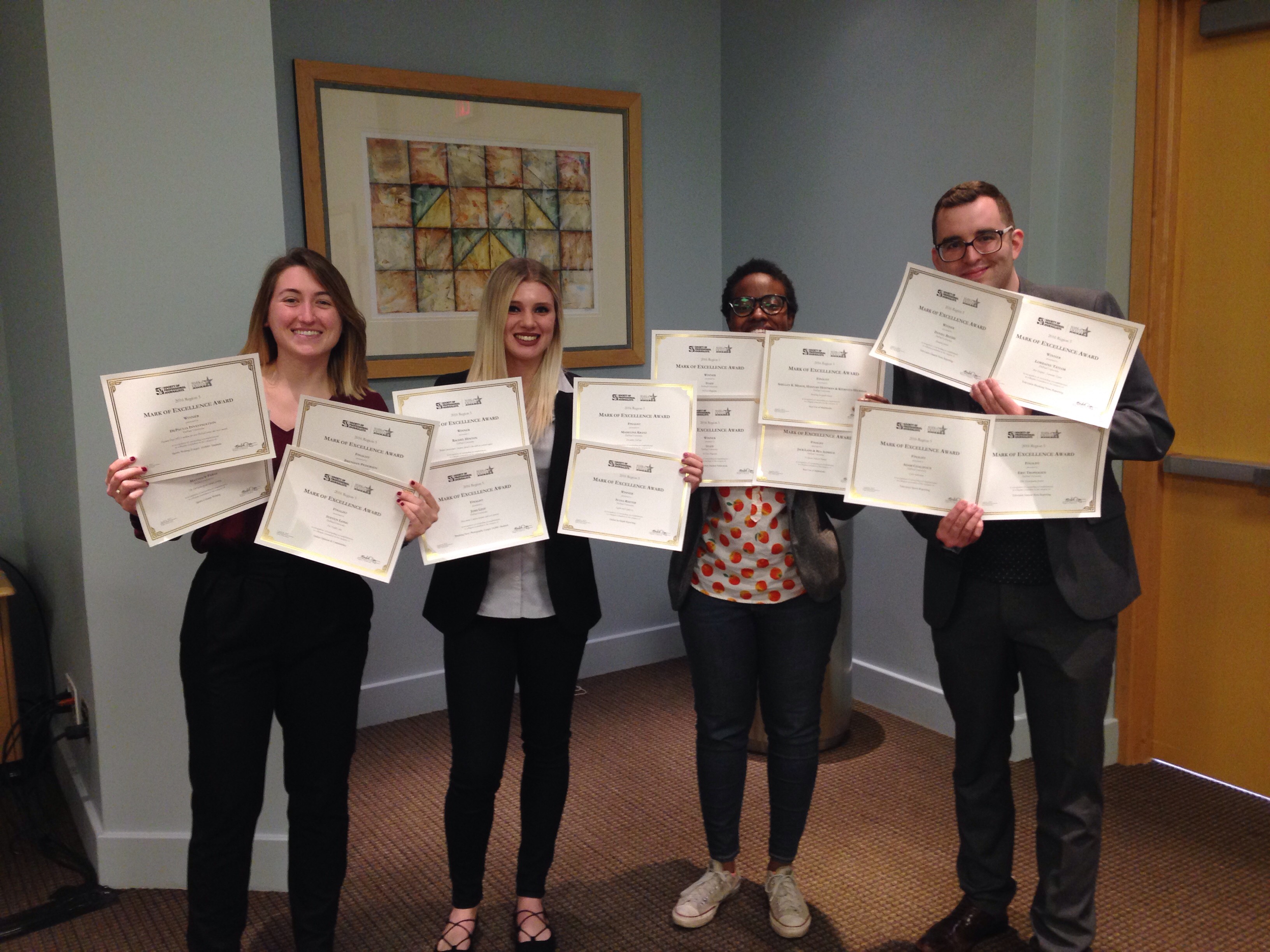DePaul SPJ/ONA Chapter officers pose with certificates for the 16 awards won by DePaul student journalists at last weekend’s SPJ Region 5 conference in Indianapolis. From left, Danielle Church, Ally Pruitt, Rachel Hinton and Kyle Woosley.
