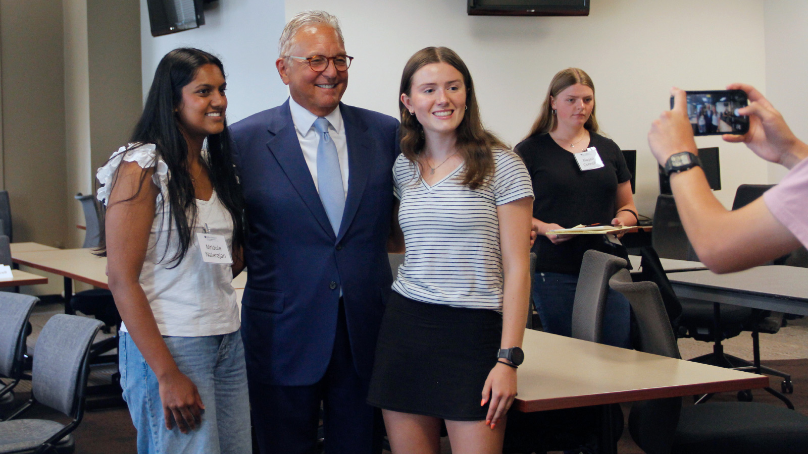 Students taking a photo with NBC 5 Chicago's Chuck Goudie