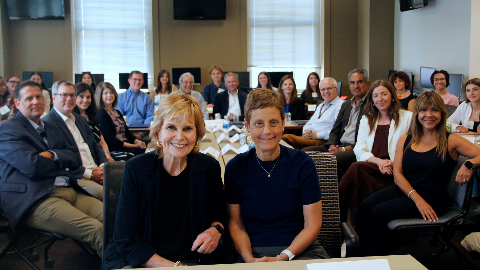Group photo of journalists and students