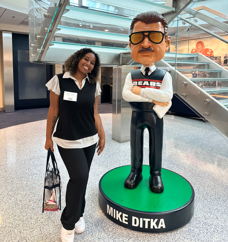 Breanna Palmer with Mike Ditka Statue