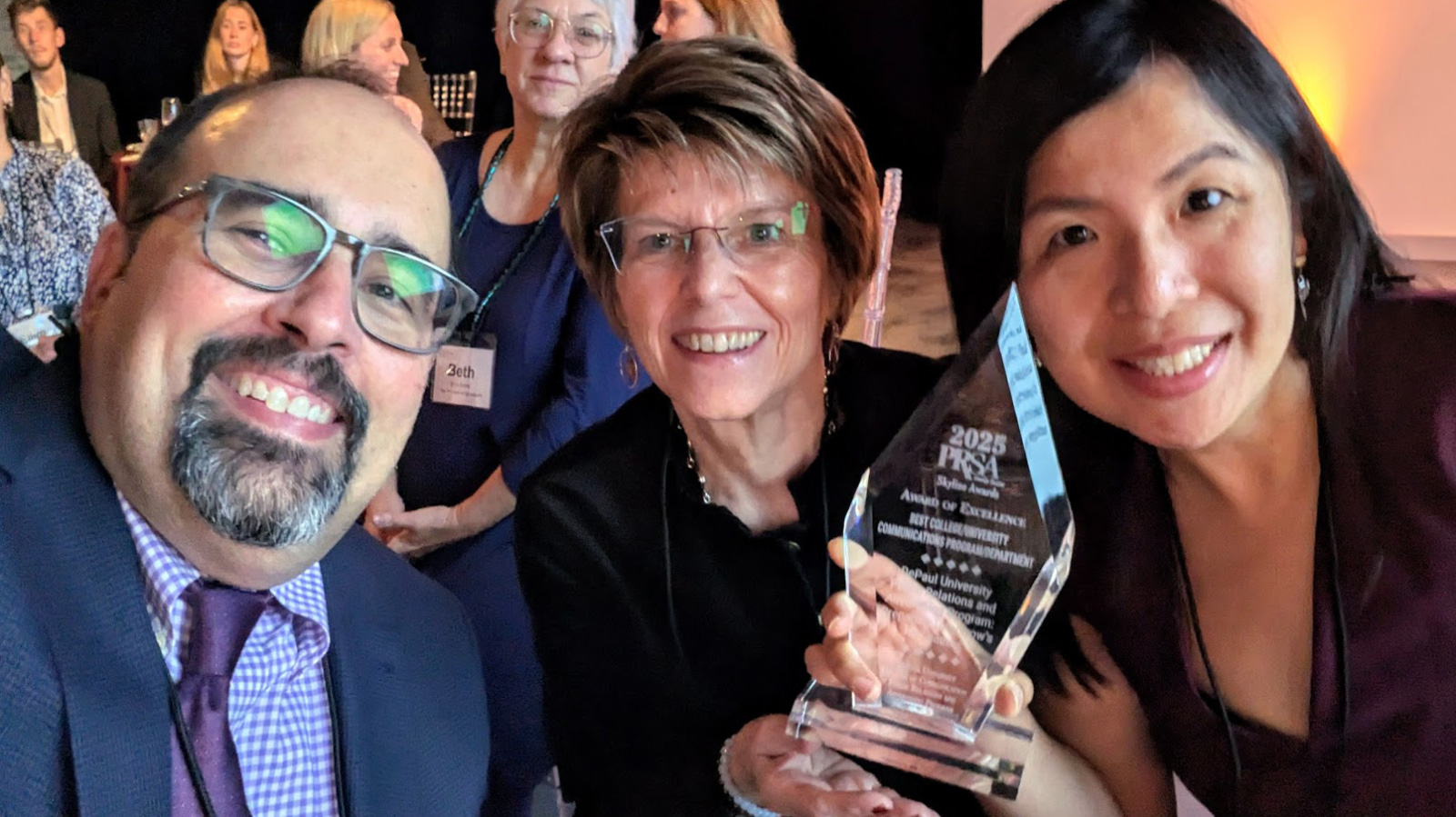 PRAD faculty holding 2025 Award of Excellence from PRSA Chicago PRAD faculty holding 2025 Award of Excellence from PRSA Chicago