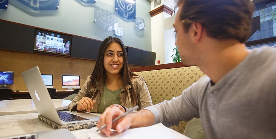 Students studying at a table